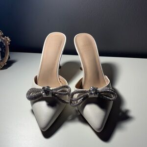 Chic White Heels with Bow Detail